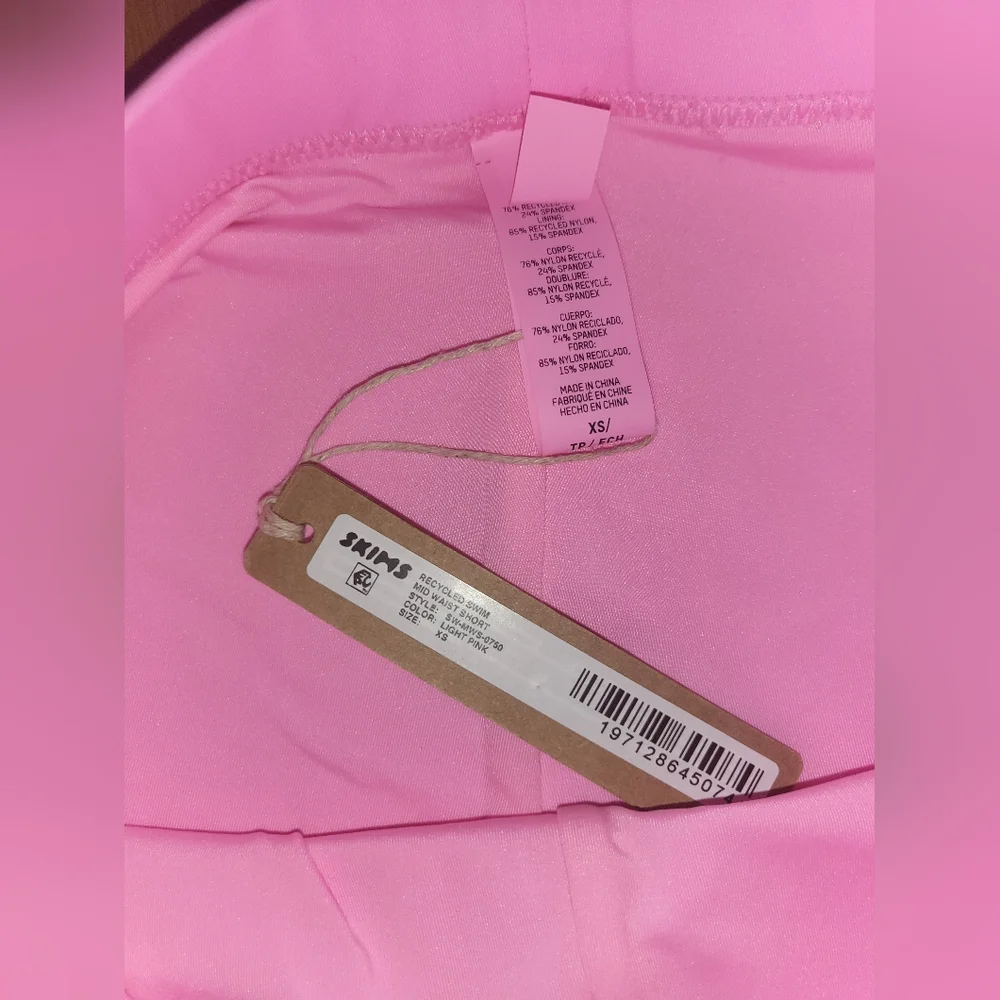 NWT SKIMS RECYCLED SWIM MID WAIST SHORT IN LIGHT PINK SIZE XS